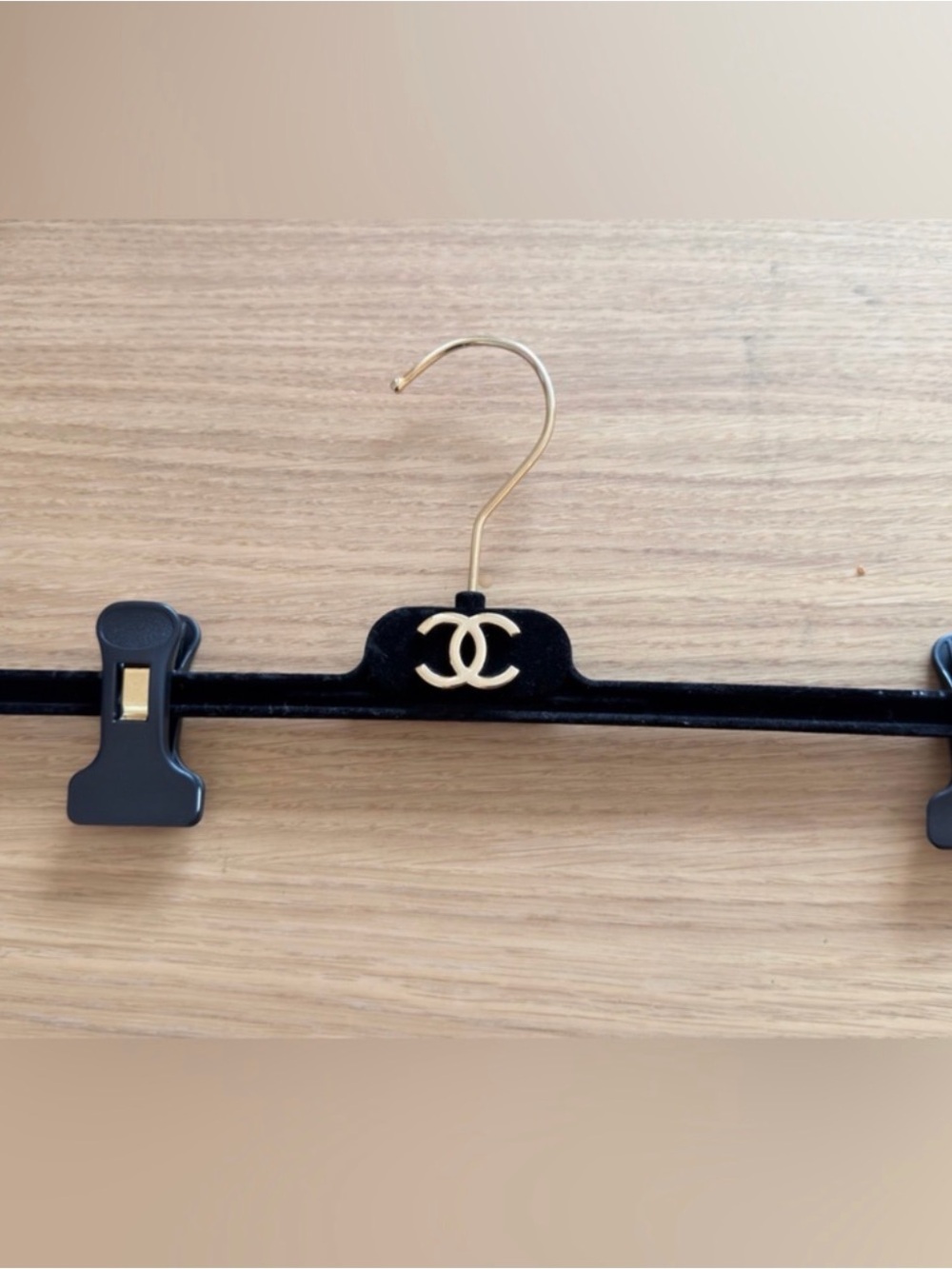 Authentic Chanel hanger accessory featuring the iconic CC logo